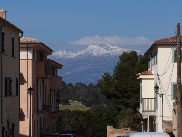 A street in Sineu, with the Tramuntana mountains in the distance