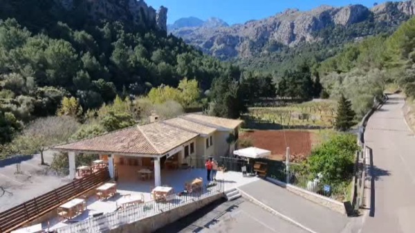 The terrace at Ses Taronges, with the Tramuntana mountains behind